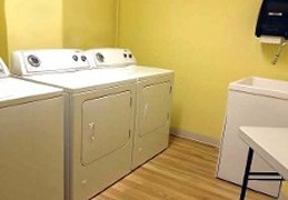 Laundry Room - Western University Apartments